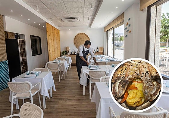 Preparando las mesas en el interior del restaurante.