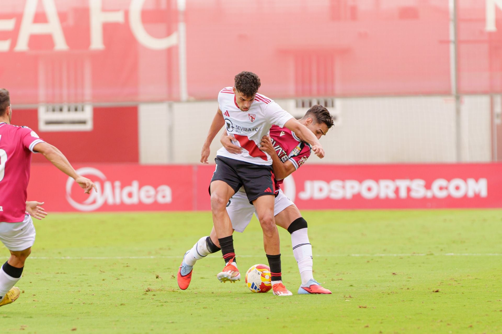 El FC Cartagena naufraga ante el Sevilla Atlético, en imágenes