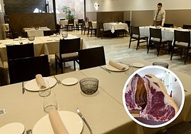 Preparación de las mesas en el comedor del establecimiento.