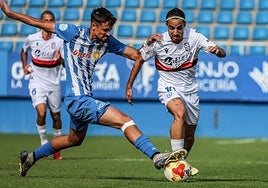 Uri frena el avance del visitante Abreu, ayer en el Artés Carrasco.