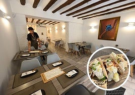 Esmero. Un camarero prepara las mesas en el restaurante.