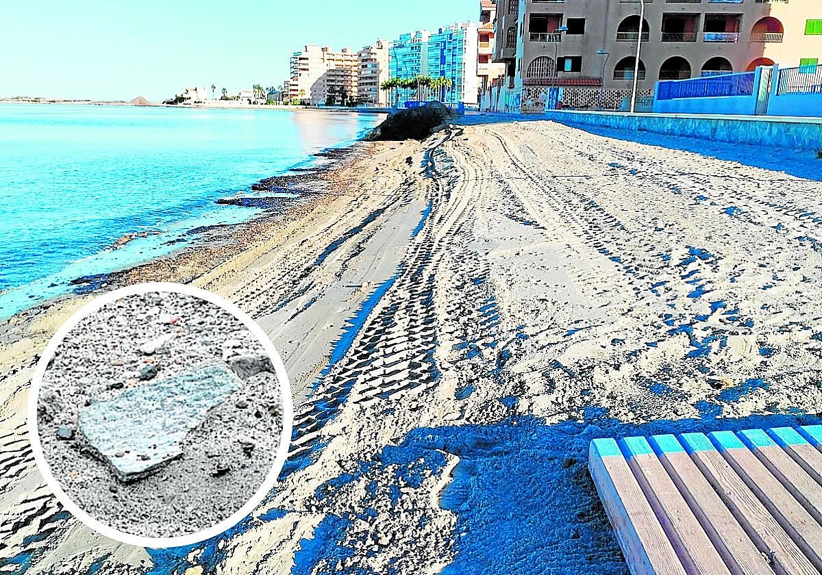 Vista de la playa de La Ensenada, ayer. En detalle, un trozo de uralita sobre la arena días atrás.