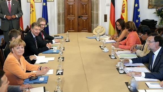 Merkel y Rajoy, durante la reunión.