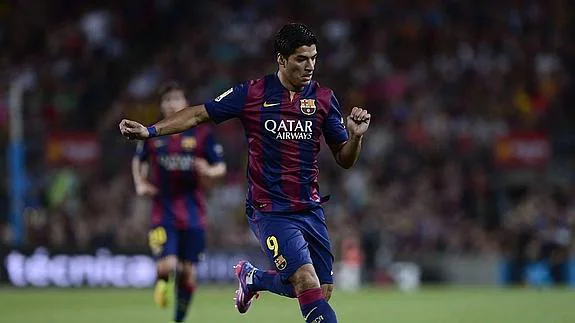 Luis Suárez, durante su partido de debut en el Joan Gamper con el FC Barcelona. 