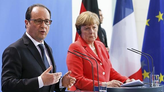 François Hollande y Angela Merkel. 