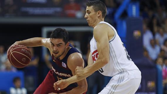 Satoransky Y Carroll, durante el primer partido de la final. 