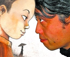 Pareja feliz. El autor Jung, de origen coreano y adoptado en Bélgica, con su propio retrato de niño en el cómic 'Piel color miel'. : AFP