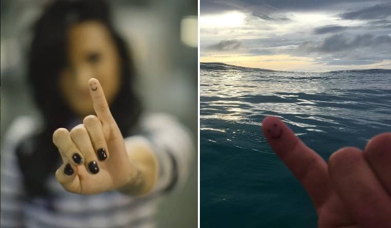 Demi Lovato muestra un tatuaje en el dedo meñique, y a la derecha, el dedo del luchador Luke Rockhold. 