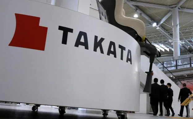 Logotipo de Takata en un feria automovilística japonesa.