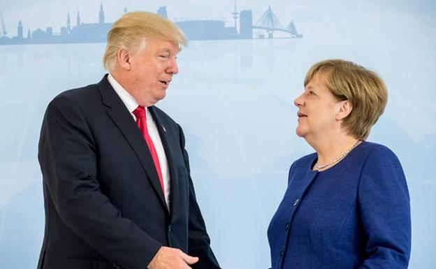 Donald Trump y Angela Merkel.