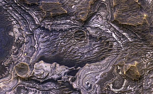 Superficie de Marte erosionada por efecto de los vientos, hiel y lava. 