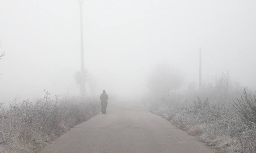 La carretera N-VI a su paso por Ponferrada, afectada por la intensa niebla