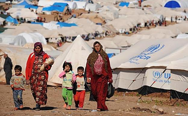 Refugiados sirios, afectados por la crisis provocada por los terroristas en su país.