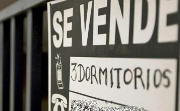 Cartel de 'se vende' en una vivienda.