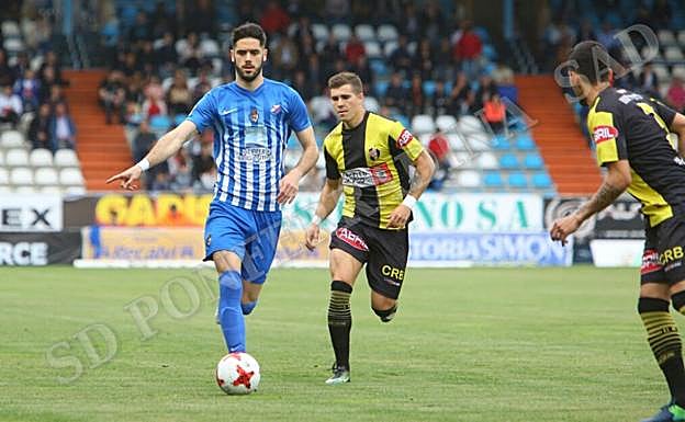 Lance de un partido de la Deportiva.