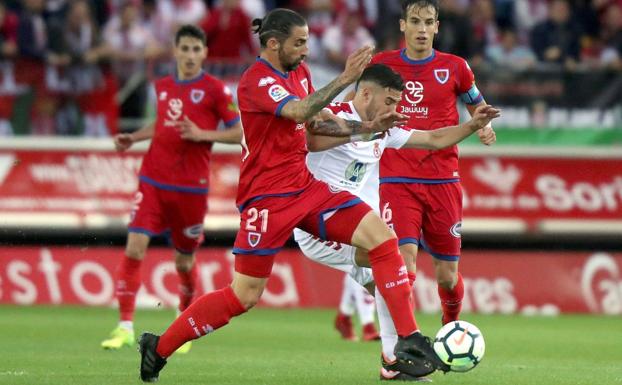 La pugna por un balón en Soria.