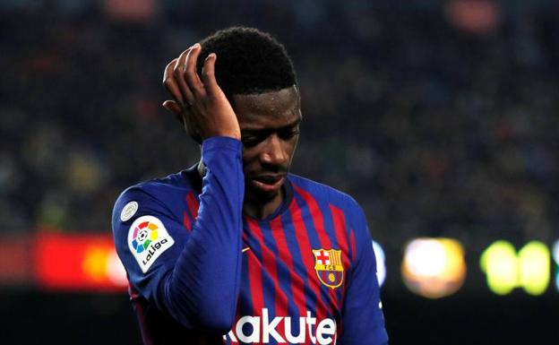 Ousmane Dembélé, tras caer lesionado. 