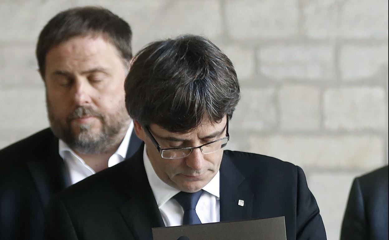 Puigdemont y Junqueras comparecen el 20 de septiembre de 2017.