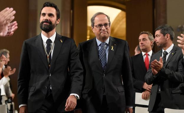 Roger Torrent (i) y Quim Torra. 