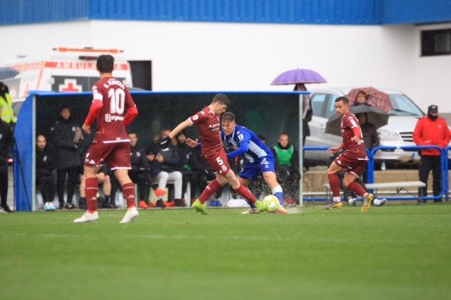 El encuentro de la jornada 12 está marcada por la lluvia y el estado del terreno de juego del campo de Ibaia