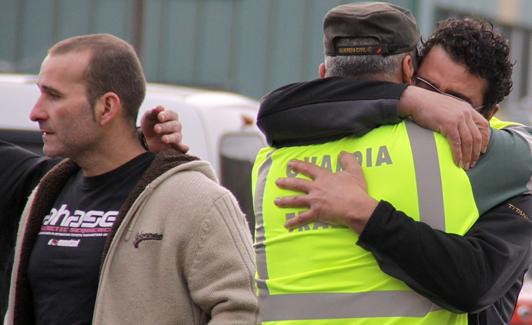 Compañeros de los mineros fallecidos en la jornada del trágico accidente.