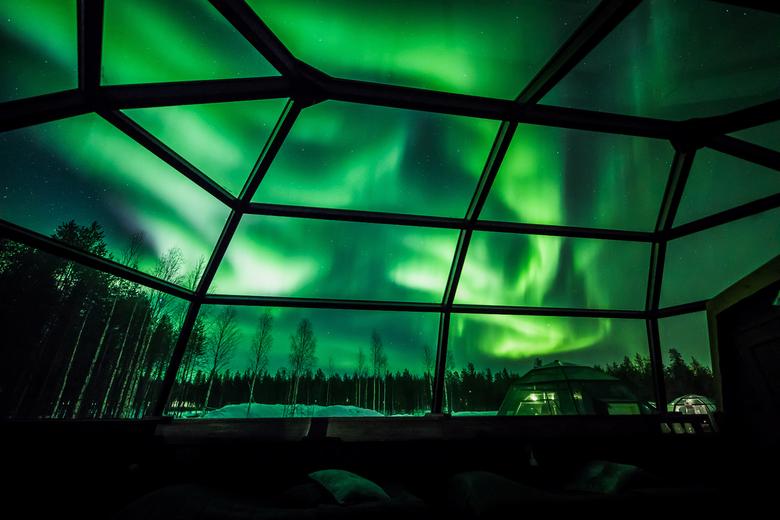 La Aurora Boreal se ve en el cielo sobre Arctic Snowhotel en Rovaniemi, Finlandia, febrero de 2019. 