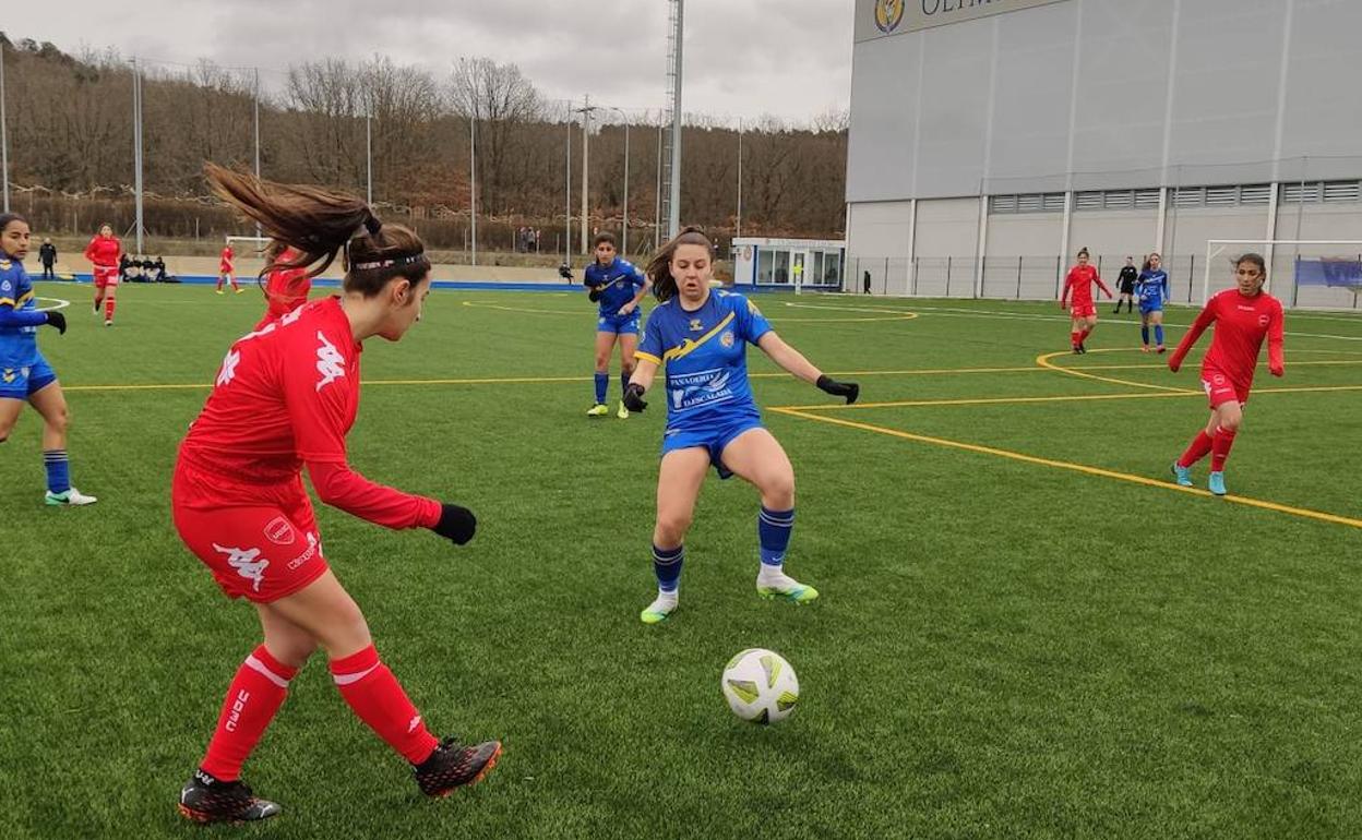 Un lance del partido.