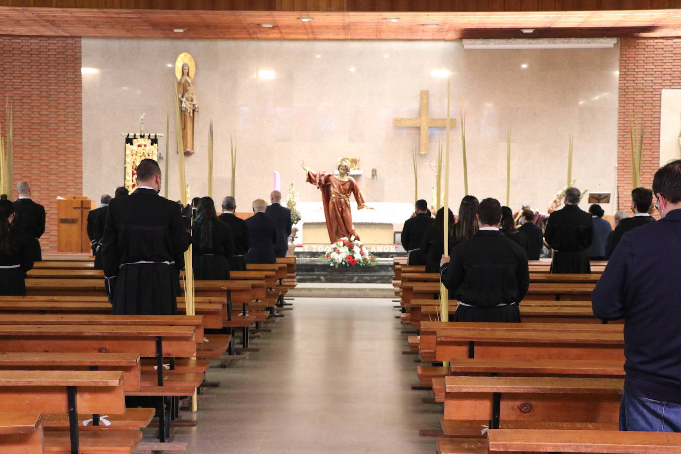 La cofradía organiza un acto en la parroquia para rememorar su Domingo de Ramos.
