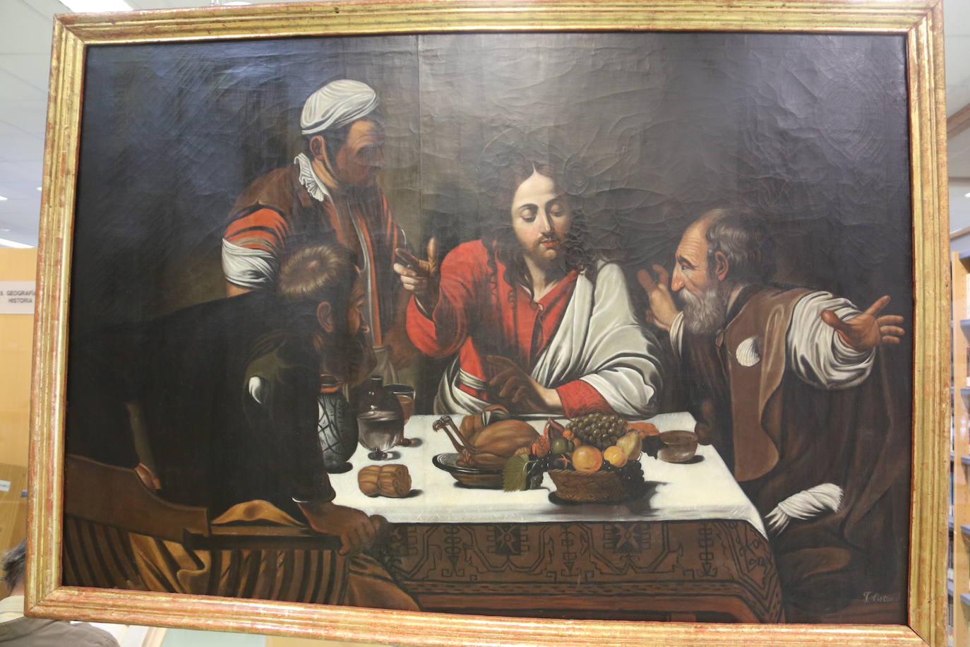 Presentación en la Biblioteca Pública de León de las dos obras restauradas por alumnas de la Escuela de Arte.