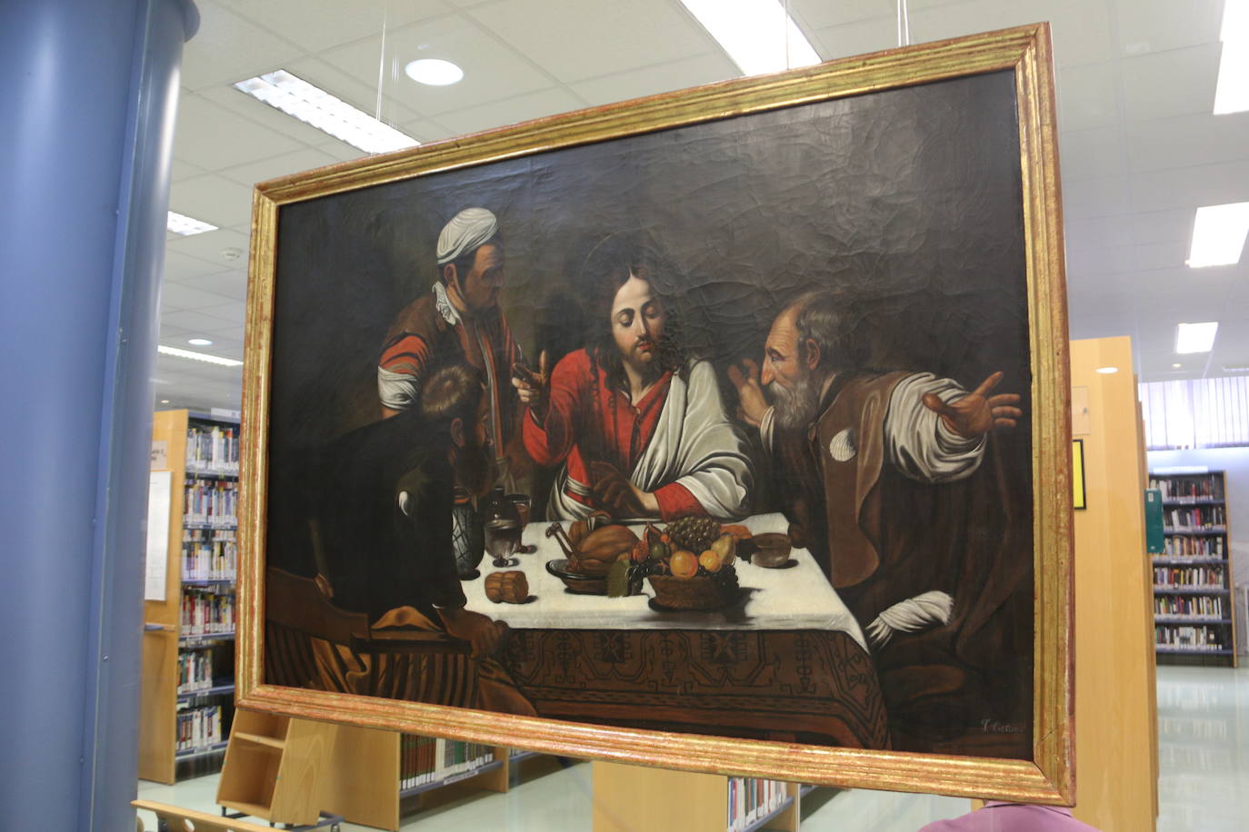 Presentación en la Biblioteca Pública de León de las dos obras restauradas por alumnas de la Escuela de Arte.