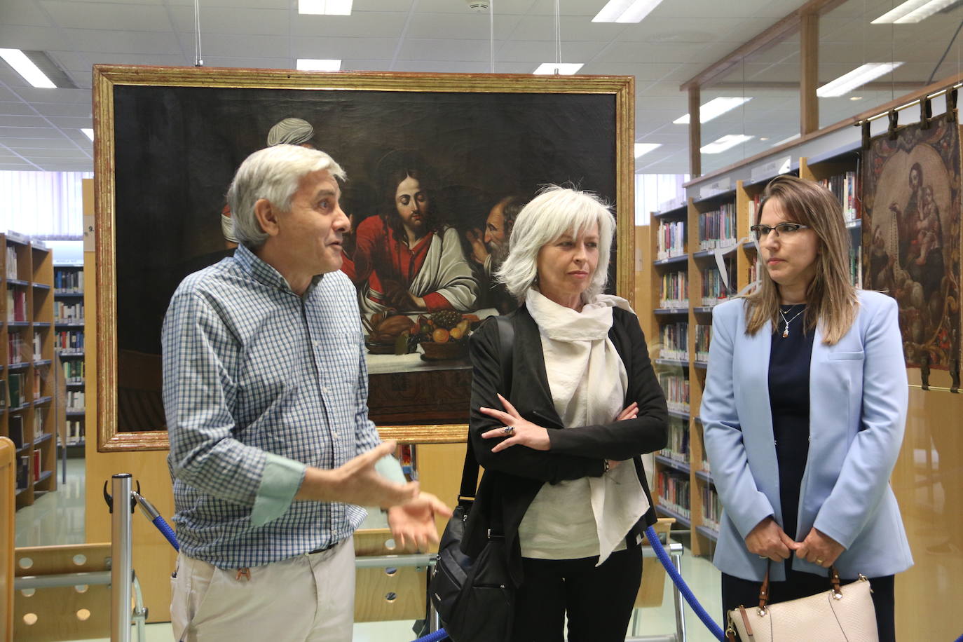 Presentación en la Biblioteca Pública de León de las dos obras restauradas por alumnas de la Escuela de Arte.