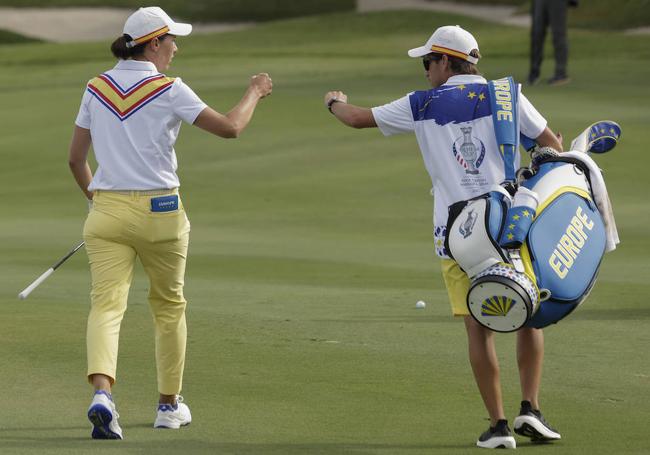 Álvaro Prada, junto a Carlota Ciganda, en la Solheim Cup de esta última semana