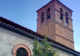 Imagen de la torre de la Iglesia de la localidad de Escobar de Campos.