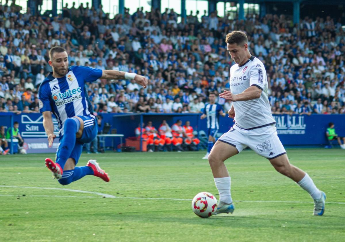 Novoa y Manu Justo, en una acción del encuentro.