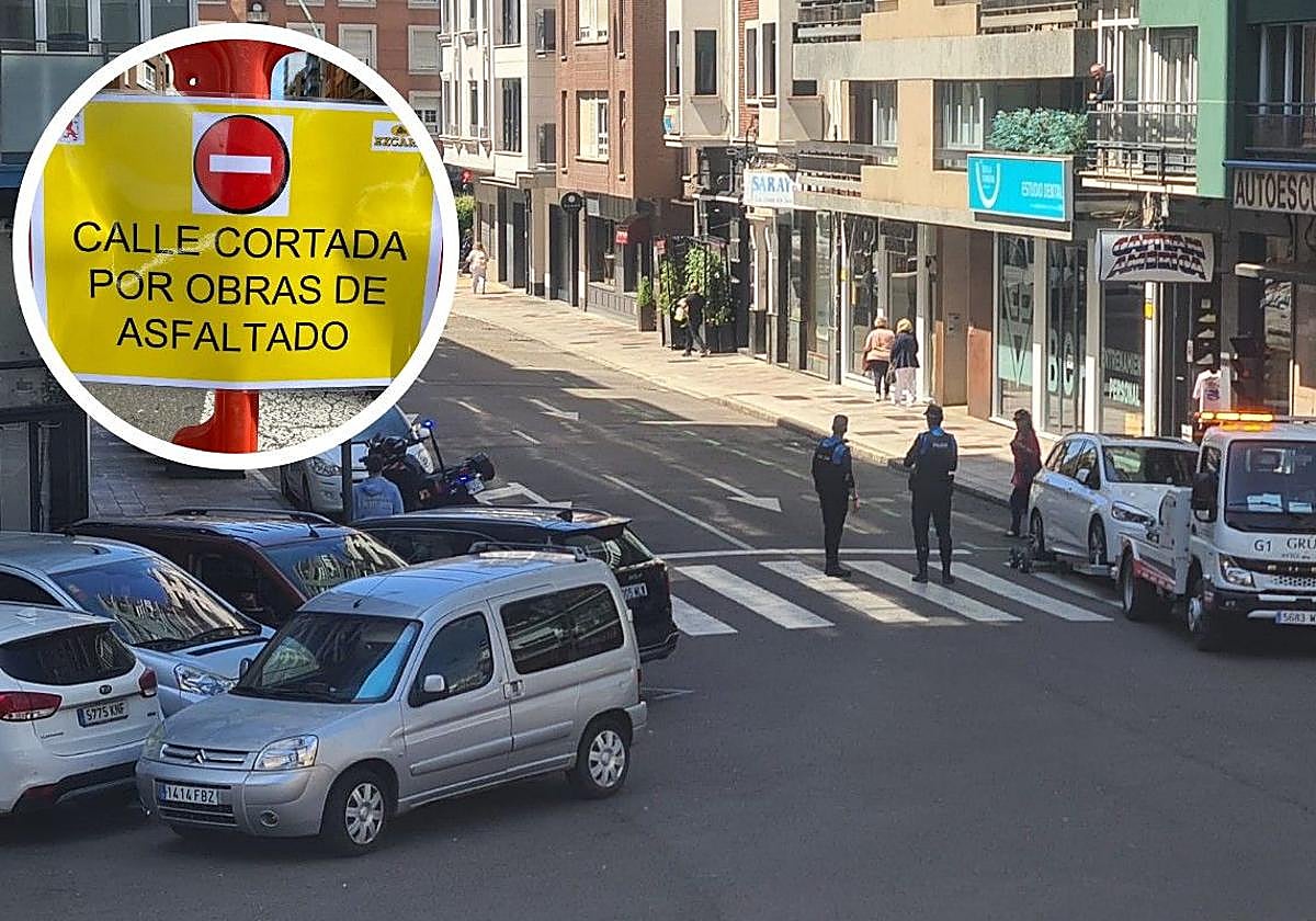 Los agentes de la Policía Municipal proceden a la retirada de uno de los vehículos situado en la Calle Villa Benavente