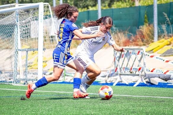 Un lance del partido entre Olímpico y Real Madrid.