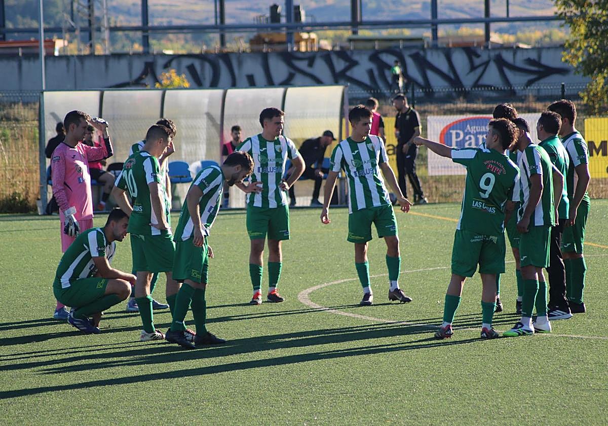 Imagen de los protagonistas del partido.