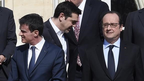 Manuel Valls, Alexis Tsipras y Francois Hollande.