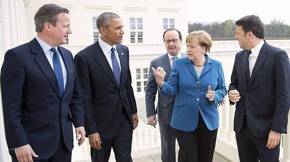 Obama y Merkel.