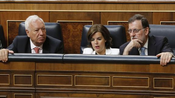 Margallo, Sáenz de Santamaría y Rajoy.