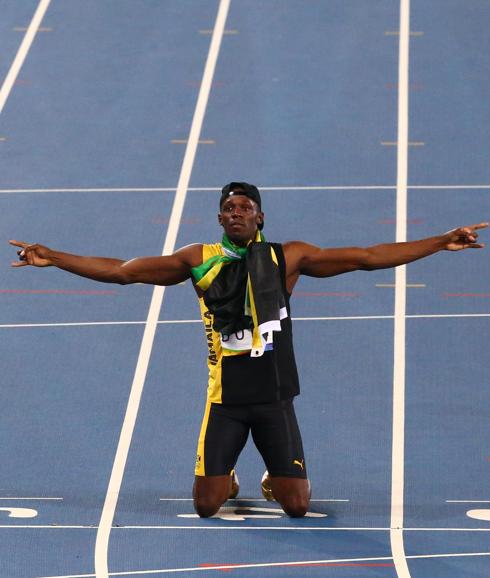 Usain Bolt posa enla pista de Río. 