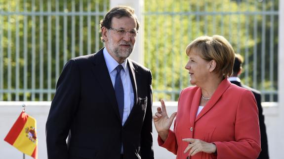 Rajoy y Merkel en una reunión en 2015