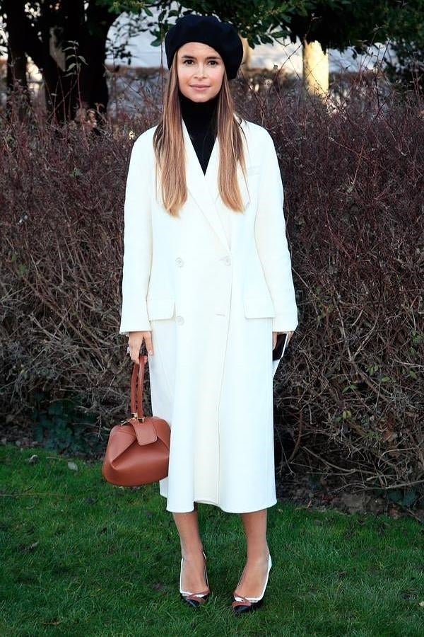 La influencer sacó su look más 'chic parisienne' para acudir al desfile de Dior.