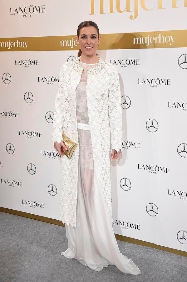 Nuestra bloguera Raquel Sánchez Silva lució un diseño de Juan Duyos, zapatos de Valentino y bolso vintage comprado en Nueva York.