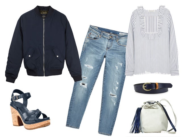 Bershka tiene en su colección de esta temporada un modelo azul marino que se convertirá en el mejor aliado de jeans rotos como estos de Blauer, una blusa de Claudie Pierlot, un cinturón de Levi's, unas sandalias de Timberland con suelo de caucho y un bolso bombonera de Mint&Rose.