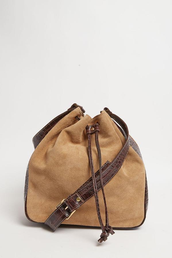 Los modelos tipo saco y los tonos tostados, dos de las tendencias de la temporada que The Code une en modelos como este (Precio: 120 euros)