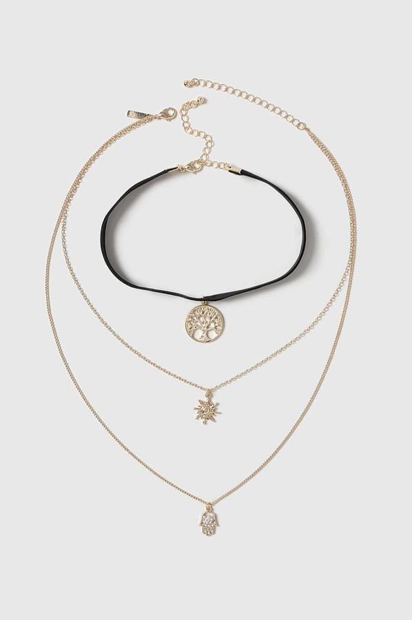 Topshop nos propone llevar el choker con dos collares largos en este pack (Precio: 16 euros)