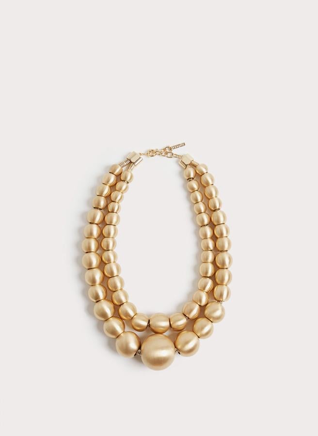 Collar de esferas doradas de Uterqüe: 79 euros.