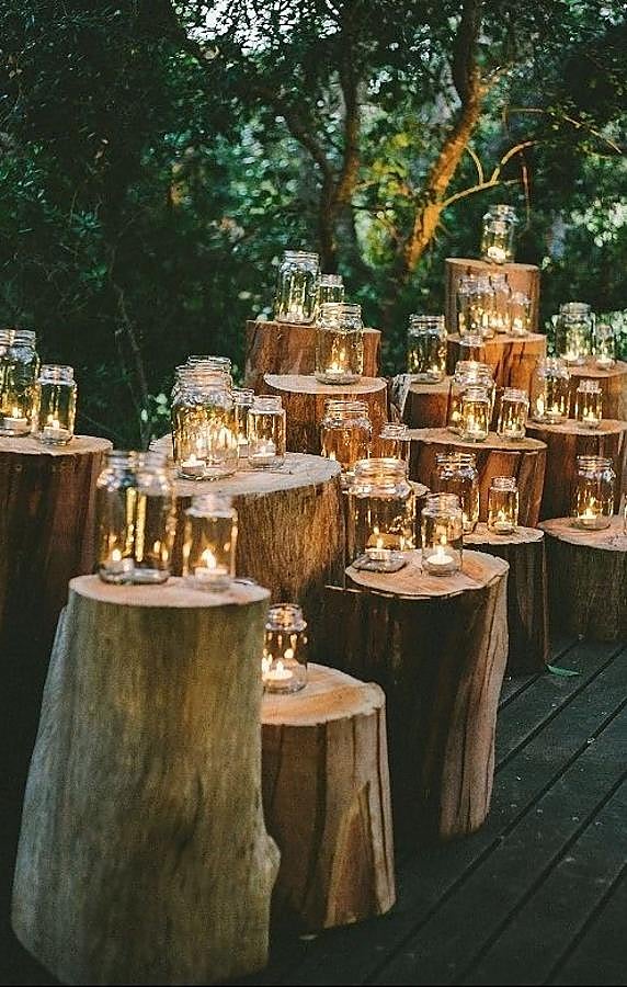 Apuesta por la iluminación cálida con velas con este montaje 'rustic chic'. (Foto: Pinterest)