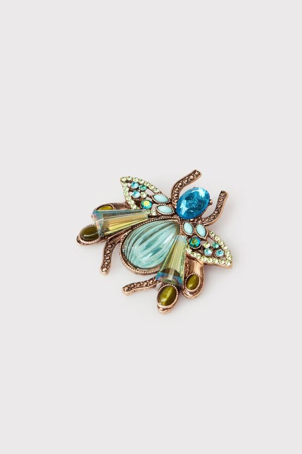 Broche beetle de Cortefiel: 19,99 euros.